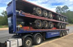 STACK OF 5 X13.6 METRE TRIAXLE FLAT TRAILORS BPW A