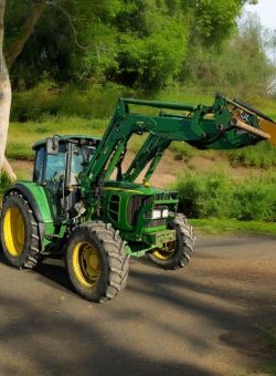 JOHN DEERE 6320 TRACTOR WITH LOADER