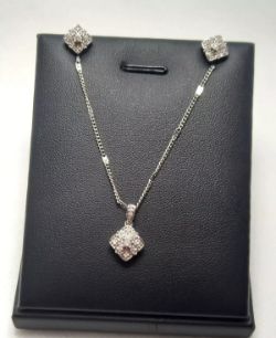0.28CT TOTAL DIAMOND EARRINGS & PENDANT SET. 925 SILVER