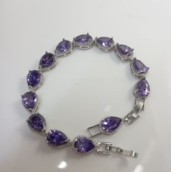SILVER BRACELET WITH PEAR SHAPE PURPLE STONES