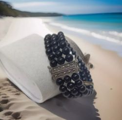 BLACK ONYX BRACELET WITH MARCASITE FASTENER. LENGTH 7 1/2