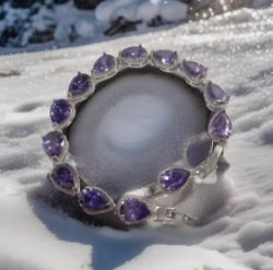 SILVER BRACELET WITH PEAR SHAPE PURPLE STONES