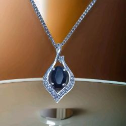 OVAL SAPPHIRE & DIAMOND PENDANT/20