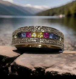 RAINBOW MULTI SAPPHIRE & DIAMOND BAND. 9CT YELLOW GOLD. RING SIZE 0 1/2