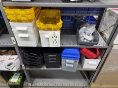 Contents of 2 shelves to include plastic battery boxes & straps