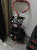 Banding trolley and associated tooling