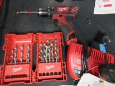 Milwaukee M12 BPD cordless drill driver, 2 x batteries, 1 x charger, 1 x drill bit set