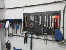 Wall mounted shadow board with contents including spanners, socket set, mallets, 'F' clamps, etc.