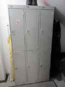 Twelve single door metal personnel lockers, some keys missing