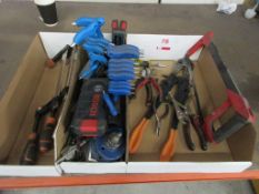 Assorted hand tools including clamps, Hex keys, drill bits, hand saw, pliers, etc.