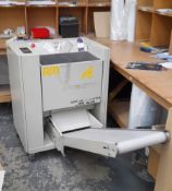 Minipack - Torre SpA hand bagging poly wrapping machine. Model: Mail bag digit, year: 2002, S/N: