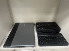 Contents of Shelf including Wireless Keyboards