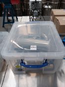 Plastic container to include various stainless steel distillery fittings