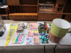 Various assorted home décor including plant pot cover, magnetic hanger frame, balloon dogs, candles