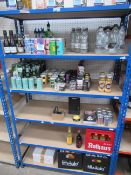 Contents of rack including canned cocktails, miniature prosecco, sparkling water, alcohol free beer,