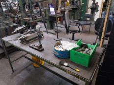 Engineers table with machine clamps, gauge, tooling