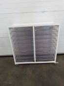 Metal framed trolley (104 x 33cm) featuring braked wheels and 18 x plastic trays