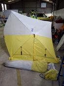 Two pop up incident shelters