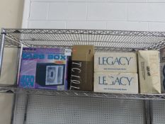 Shelf of Assorted Car Audio Subwoofers.
