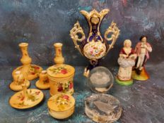 A Victorian Rococo two handled vase, decorated with stylised flowers on a blue ground, 22cm high,