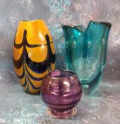 A mid 20th century ovoid vase, combed in blue on a mustard, 24cm high, c.1950;  another, blue,