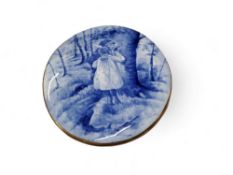 A Royal Doulton type Blue Children oval plaque, with two children looking into a tree bough, gilt