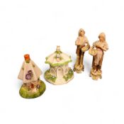 A pair of Royal Dux figures, Fisherman and Companion, 16.5cm high, triangle mark;  a Coalport pastel