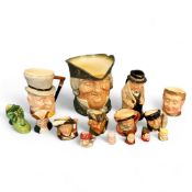 A Royal Doulton character jug,  Parson Brown, large;   others, Winston Churchill;  Robin Hood,