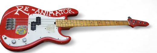 A 1980's Korean Cort P bass guitar, red finish, 117cm long