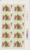 A carton containing three albums/binders of GB and world stamps, postcards and loose stamps.