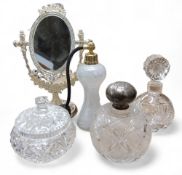 An Edwardian globular scent bottle, strawberry cut, domed silver cover, embossed with cherubs , 13cm