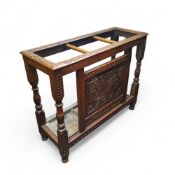 A late Victorian English oak country house walking stick or hall stand, carved oak leaf top with