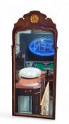 A George III Revival walnut looking glass, parcel gilt scallop motif, 80cm high
