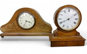 A late 19th century mahogany mantel clock, Roman numerals, drum case on scroll spreading square