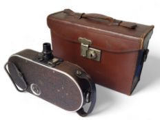 An unusual Bell & Howell Company, Chicago, 'Filmo' automatic cine camera No.75, with faux leather