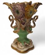 A 19th century Coalport two handled rococo vase,  encrusted and painted with colourful flowers, in