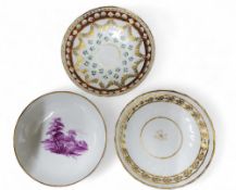 A Pinxton saucer, decorated with cornflower sprigs and gilt swags, banded with roundels, c.1796-