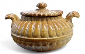 A 19th century S. & H. Briddon, Brampton brown salt glazed stoneware fluted sucrier and cover,