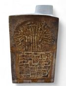 A Troika slab sided chimney vase, decorated and inscribed with a roundel and geometric shapes, 19.