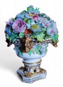 A Sampson Hancock floral vase, encrusted with colourful summer flowers, campana shaped base, applied
