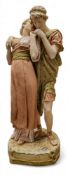 A Royal Dux Bohemia figural group, modelled as two young lovers, in classical dress, in shot