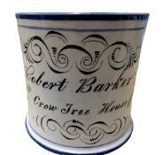 A 19th century creamware mug, inscribed Robert Barker Crow Tree House, stylised flowers and foliage,