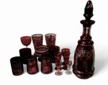 A Bohemian ruby flashed glass decanter, etched with spiralling fruiting vine, 36cm high, c.1880;