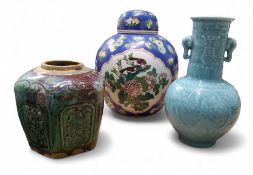 A Chinese ginger jar and cover, decorated with mystical birds and peonies, on a blue ground, 28cm