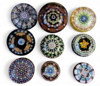 A Perthshire millefiori domed paperweight, coloured canes, 7cm diam;   others  (9)