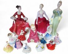 A Royal Doulton figure, This Little Pig, printed marks, HN1793;  others, Stephanie, HN2811;