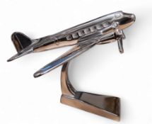 An Art Deco style chrome model, of a Dakota, 16.5cm high