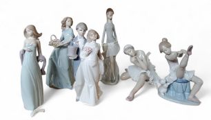 A Lladro figure, Wedding Bells, 6164; others, Spring Enchantment, 6030;  Ballerinas;  etc