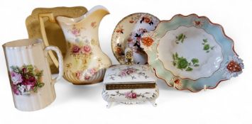 An early 20th century gilt metal mounted porcelain table cigarette box, decorated with roses, scroll