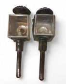 A near pair of late 19th century brass and black carriage lanterns,  46cm high